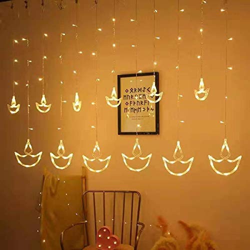 20306  12 Diya LED Curtain String Lights – 138 LEDs, 8 Flashing Modes, Warm White Copper Wire Decorative Lights for Diwali, Christmas, Wedding, Home