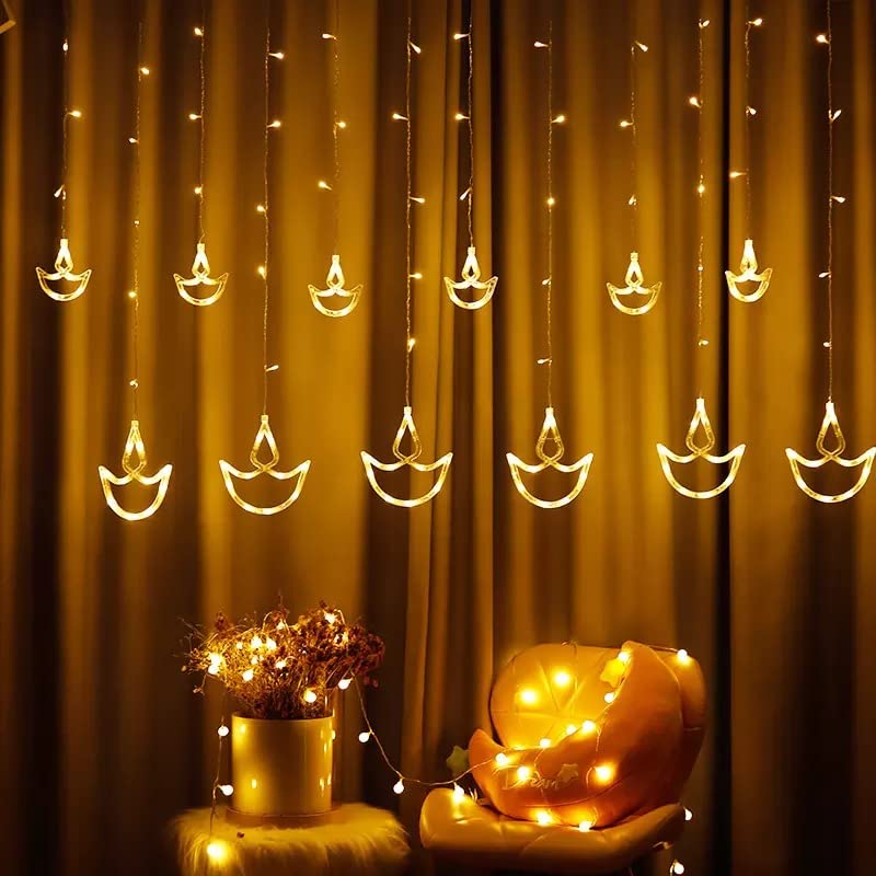 20306  12 Diya LED Curtain String Lights – 138 LEDs, 8 Flashing Modes, Warm White Copper Wire Decorative Lights for Diwali, Christmas, Wedding, Home
