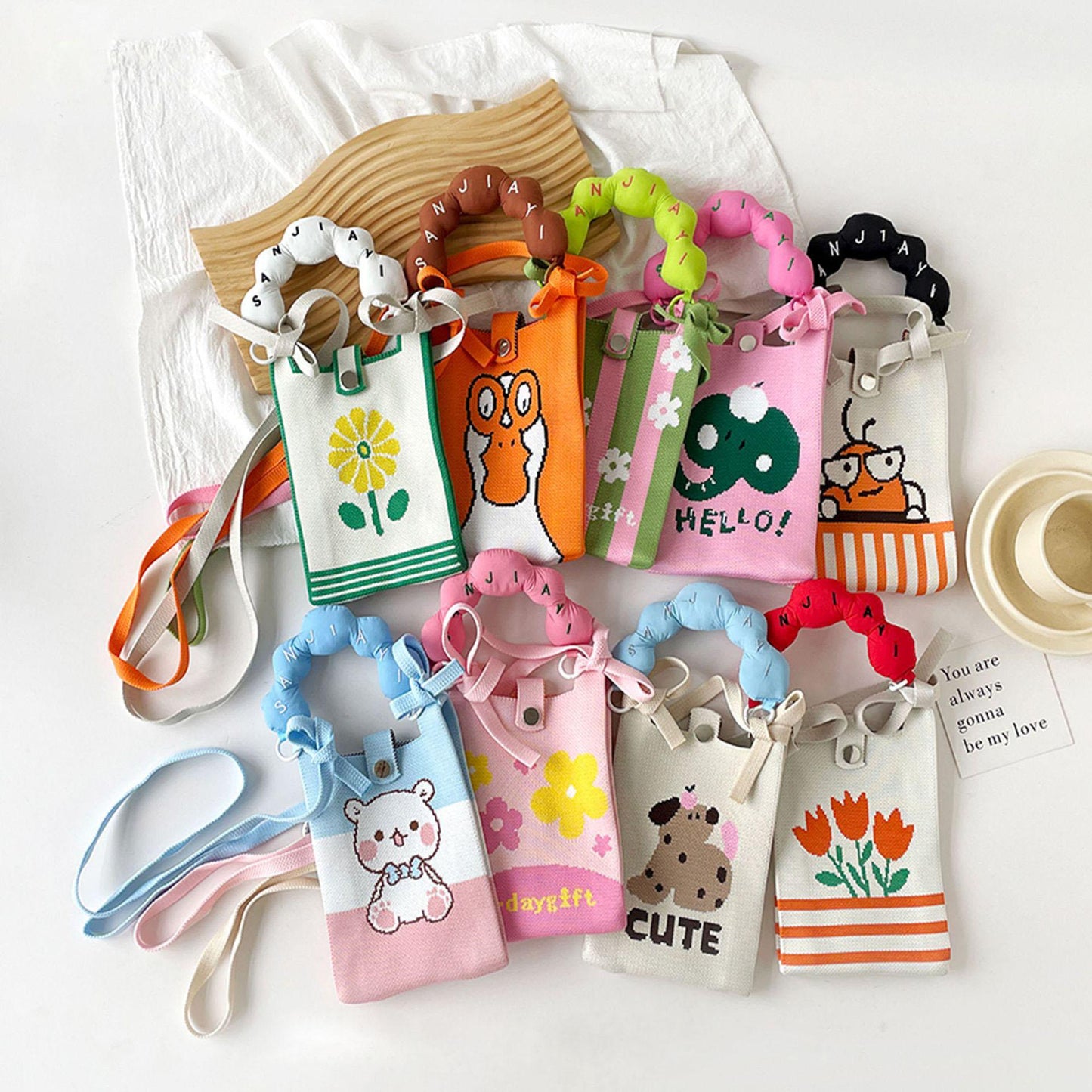 20484 Kosoul New fashion shoulder bag mini knitted mobile phone bag Korean version versatile small portable change bag messenger bag Cute animals {Random Design}