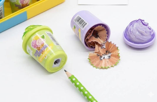 21174 The image displays three ice-cream-shaped pencil sharpeners alongside colorful pencils on a clean