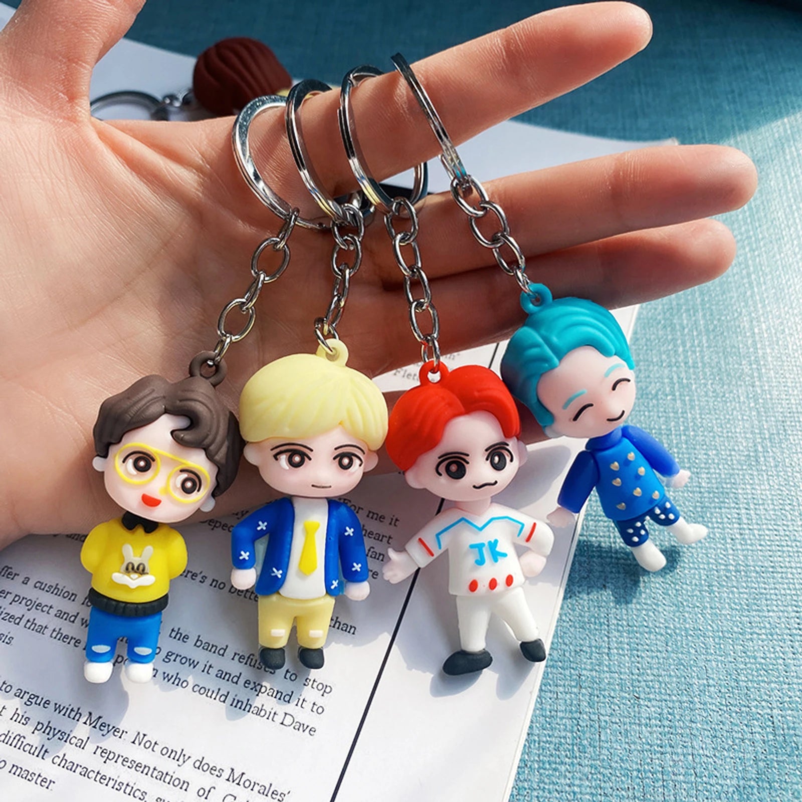 20507  {Pack of 12 }BTS Silicon Soft Rubber Keycahins Multicolored